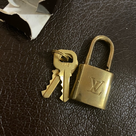 100% Authentic Lv lock and keys set 🔐 - Picture 2 of 4